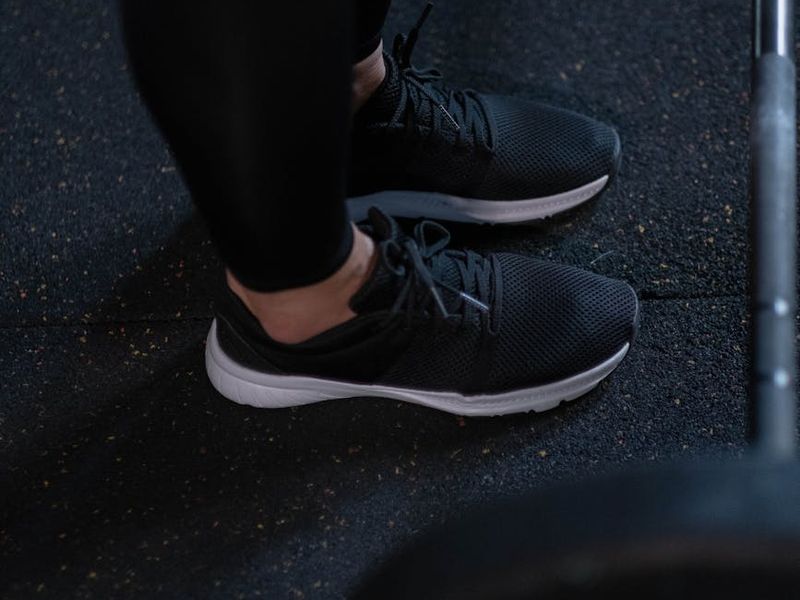 Detailed shot of athletic shoes on a clean gym floor